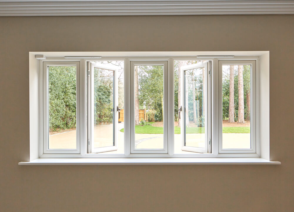 Dual casement windows, in white, interior shot