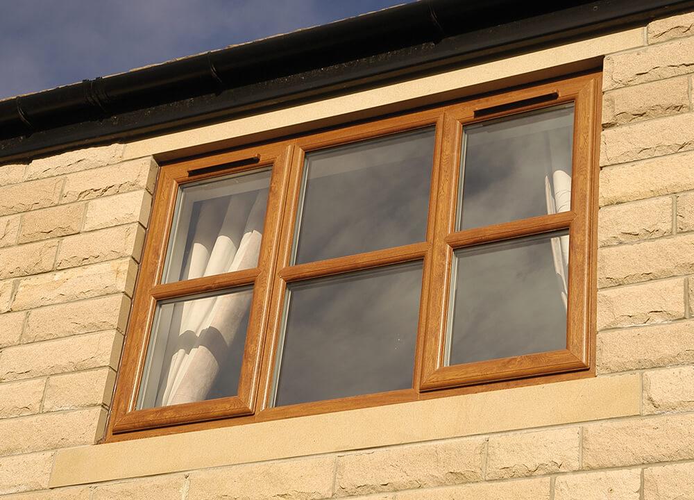 Golden oak coloured casement windows