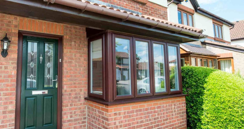 Rosewood coloured bay windows for a residential home